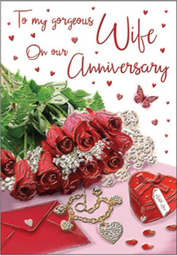 This romantic anniversary card design unfolds like a private love note waiting to be opened somewhere in Surrey Quays. A posy of crimson red roses sits at the heart of the image, each swirl of petal richly pigmented and almost touchable, as if freshly arranged by hand. The roses are nestled in bright greenery, small leaves and fronds creating a sense of movement and vitality, reminiscent of the pockets of green around Greenland Dock. Just beside them rests an envelope, hinting at heartfelt words inside, partnered with a dainty jewellery piece and a cherished heart-shaped keepsake box. These details, placed with obvious care, feel like gifts carefully chosen over many shared years. Across the card's surface, tiny hearts are lightly scattered, catching the soft light in little gleams of red and rose-gold, while a single butterfly motif appears to drift across the composition, adding a whisper of whimsy. The text on the card is scripted in an elegant, flowing style, though not fully legible, inviting the viewer to imagine tender anniversary wishes. Illumination is warm but gentle, casting subtle shadows and highlights that draw the gaze from the roses to the jewellery and back again. The overall mood is intimate and sincere, echoing the feeling of surprising a partner with flowers and a card delivered to a quiet flat overlooking the Quays, or to a cosy home off Lower Road-an image that celebrates enduring love and shared futures.