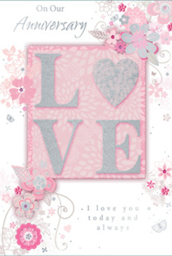 This anniversary card is shown in close focus, its surface bathed in soft, even light that draws out every blush, pearl, and silver highlight, like the gentle reflections along the water near Surrey Quays station. At its heart, the word "LOVE" appears in large, raised lettering, dusted with subtle glitter that forms a tactile, sparkling texture under the fingers. The letters stand out proudly against a smooth blush-pink panel, giving the impression of a carefully framed centrepiece, much like a focal bloom in a romantic bouquet. Surrounding this focal word, a swirl of hand-drawn flowers, leaves, and curling stems stretches across the card, arranged with the same thoughtful balance a florist might use when designing an anniversary arrangement for a couple living near Canada Water or Surrey Quays Road. The blossoms are soft tones of pink, ivory, and gentle grey, with hints of silver detailing that glint when the light passes over them, evoking the refinement of silver wedding keepsakes. Their fine outlines and shaded petals create a sense of movement, as if the blooms are quietly drifting on a spring breeze. The background is a tender, muted pink that adds warmth without overwhelming the delicate illustration, creating a serene, romantic mood. A refined anniversary message, printed in flowing script above and below the central motif, completes the composition, its gentle phrasing mirroring the quiet promises shared over years together. This design feels like a paper echo of a Surrey Quays florist's work: refined, heartfelt, and composed with a deep understanding of how colour, texture, and sentiment can honour a cherished love story.