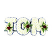 A serene, hand-crafted funeral tribute spells out TOM in large, three-dimensional letters, each form densely cloaked in small, pristine white chrysanthemum-like blooms that create a pillowy, tactile surface. The overall effect is soft and consoling: the rounded petals nestle closely together so the letters read as luminous cushions of white, their volume catching a soft, even light that leaves delicate shadows in the flower seams. Each letter's edge is crisply traced with a royal blue ribbon, the deep blue acting as a formal frame that sets the white into sharper relief and lends a quietly dignified air. Placed thoughtfully within the face or lower portion of each letter is a small, symmetrical spray-a single dark red rose as the focal heart of each cluster, accompanied by tiny ivory spray roses and slender fern fronds. The contrast between the velvety red centers and the cool white chrysanthemum backdrop feels intimate and respectful, a visual language of deep love and tender sorrow. Lush green foliage peeks through the petals, adding texture and a hint of earthy scent beneath the florals' subtle perfume. A thin, dark metal bar and support frame are visible beneath the base, indicating how the letters are designed to stand at a service. The composition sits against a clean white background so every ribbon edge and petal is clearly visible. As a Surrey Quays tribute appropriate for memorials at nearby Greenland Dock or Canada Water chapels, this arrangement reads as both a personal name and a comforting embrace for mourners, crafted with steady, thoughtful hands.