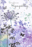 This sympathy card feels like a whispered poem painted in watercolour, the sort of scene you might imagine while watching the sky shift above the Surrey Quays marinas at dusk. Airy wildflowers, fine as pencil sketches yet softened by washes of colour, rise gracefully from the base of the card. Their slender stems and umbrella-like heads are tinted in graceful gradients of lavender, indigo, and soft blue, with hints of silvery green that echo grasses stirred by a light breeze. Some blossoms are sharply etched; others fade delicately at the edges, as if dissolving into the surrounding light, evoking the way memories can be both vivid and gently blurred. Across the background, faint impressions of petals and foliage drift like distant clouds, creating a dreamlike, layered depth while never overwhelming the eye. Among the stems, butterflies hover in a few carefully chosen places, rendered so lightly that their wings seem to shimmer rather than sit flat on the paper. They suggest transformation and a comforting presence, a quiet reminder that love continues in another form. The palette remains cool yet soothing, casting an overall mood of calm reflection, much like standing by the river and letting thoughts settle. Any message of sympathy written within this card is embraced, not overshadowed, by the artwork. It provides a respectful visual setting for condolences sent to family or friends in and around Surrey Quays, offering the recipient a gentle space for remembrance, framed by nature's soft colours and the unspoken language of flowers.